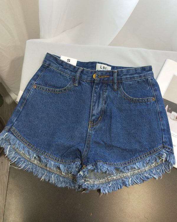 Einfarbige Retro-Jeansshorts mit hoher Taille, Fransen und offenem Saum