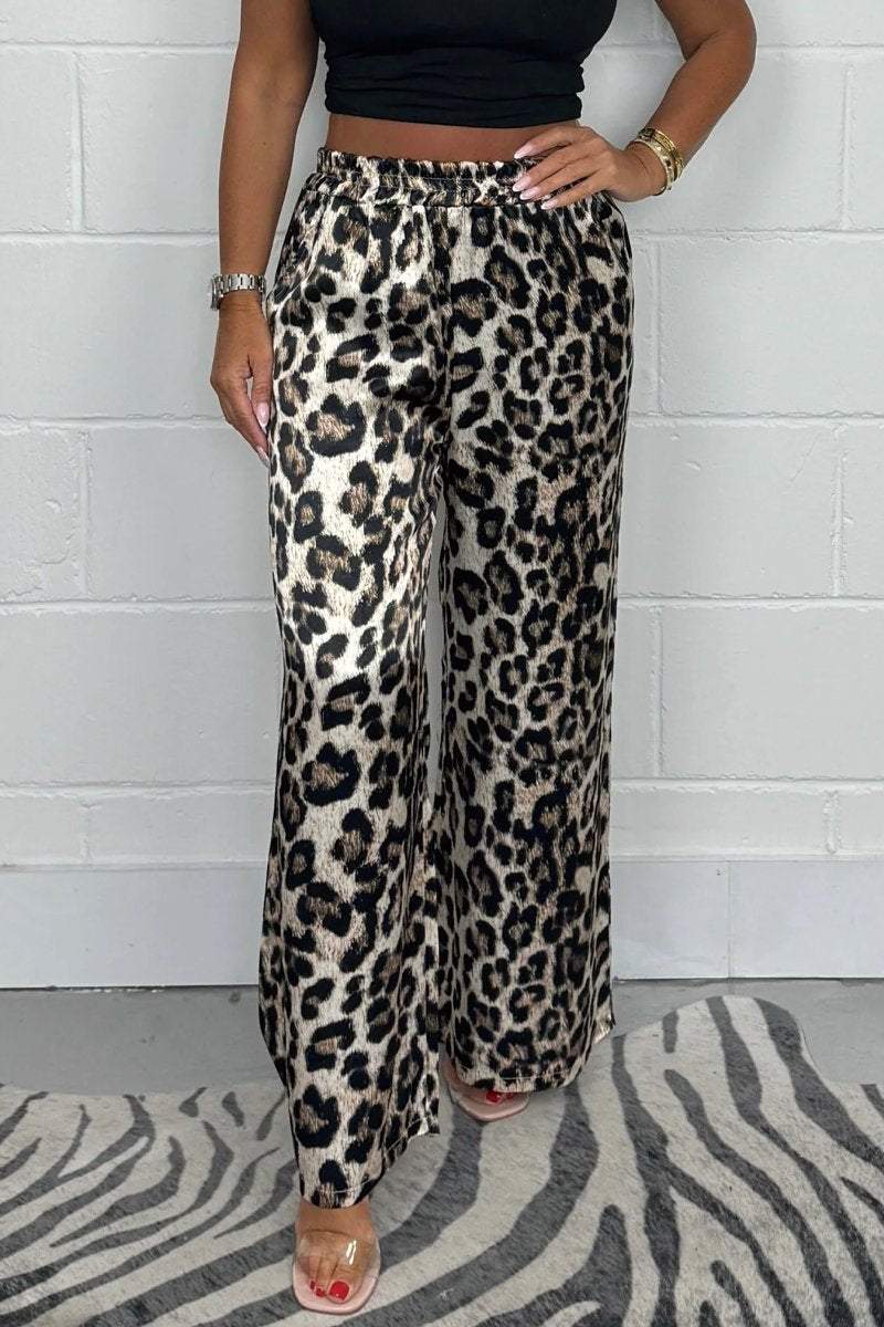 Women's Shiny animal print trousers